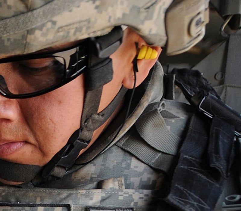 soldier wearing 3m combat earplugs
