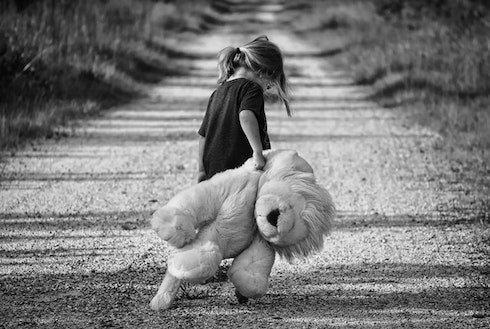 child with a stuffed animal